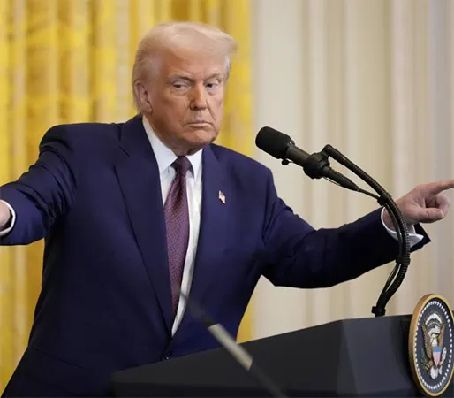 President Donald Trump talks on automobiles