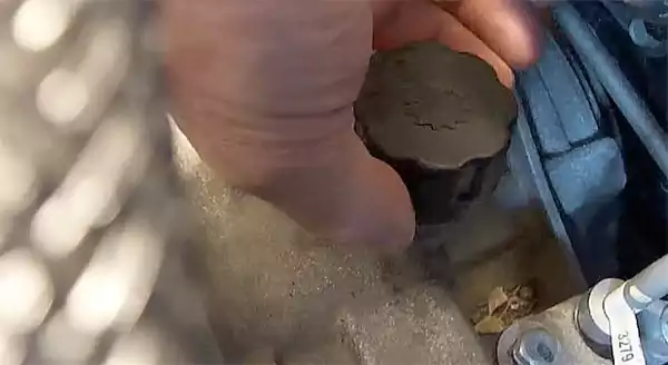 Removing the fill plug